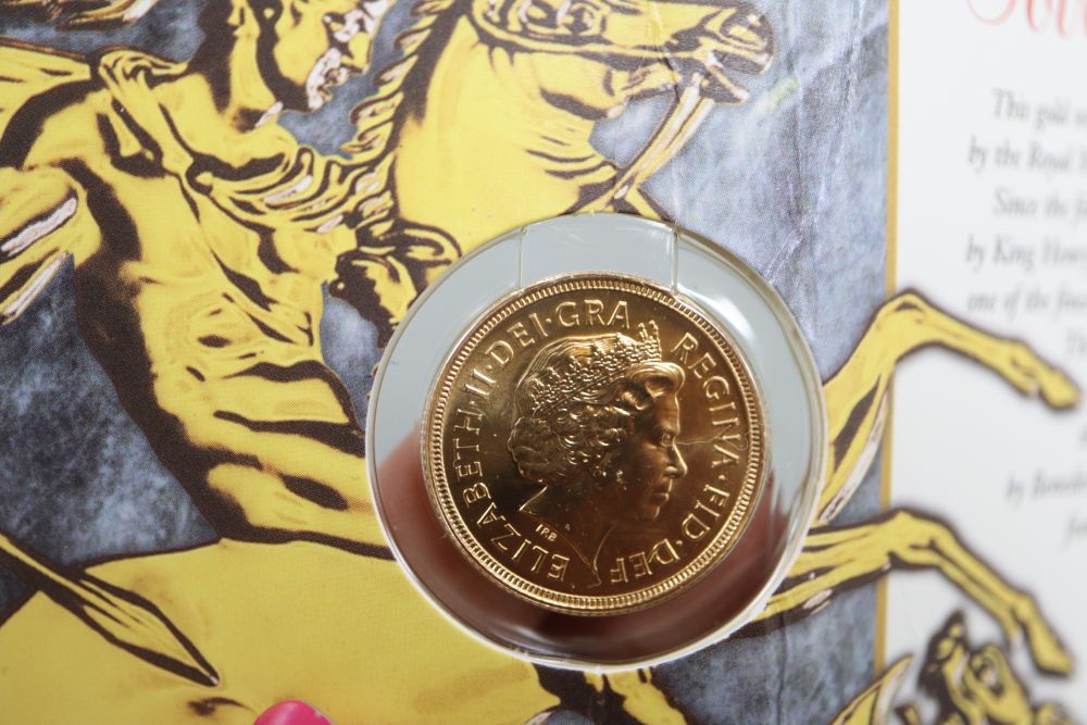 A 2000 gold sovereign, in Royal Mint packet.